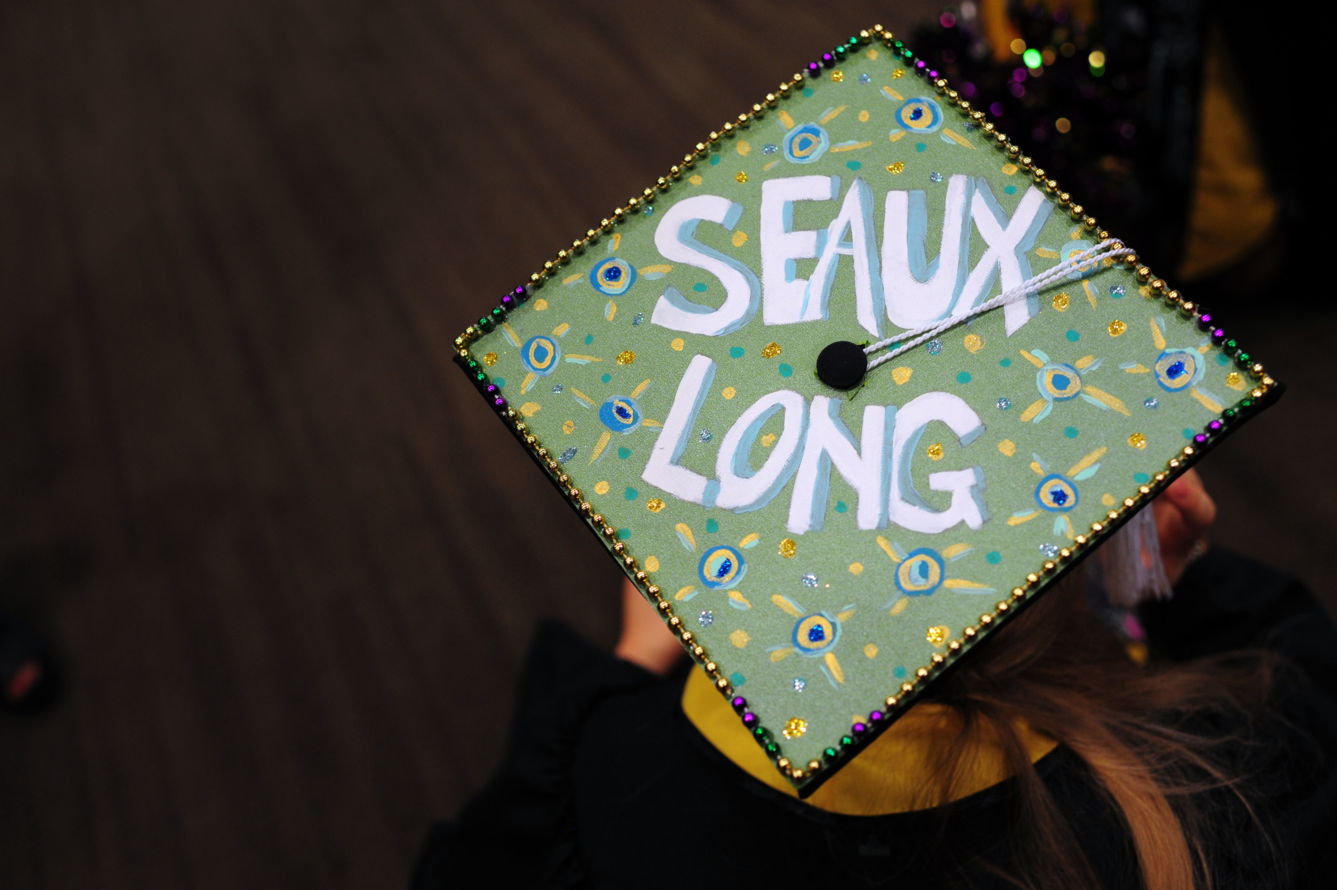 Graduation cap with "Seaux Long" painted on it. 