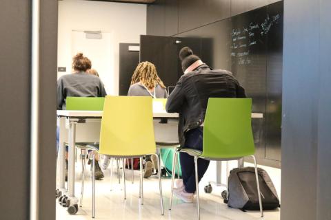 Students studying in classroom.